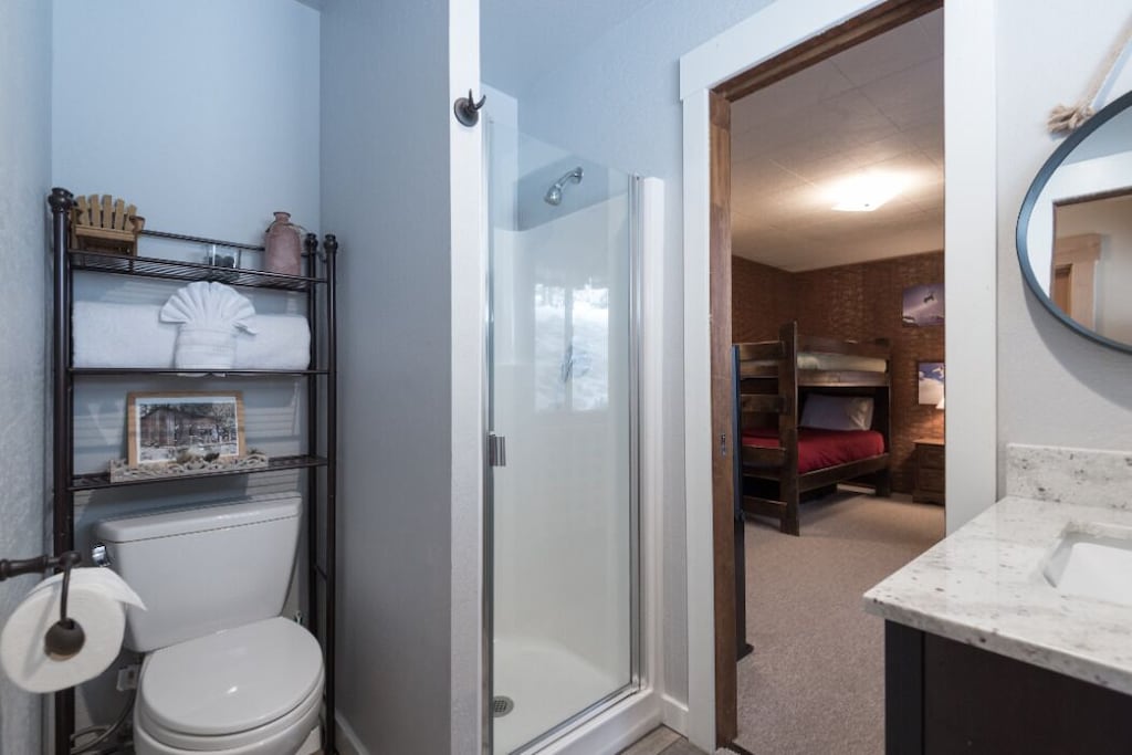 En suite bathroom attached to the bunk room, with shower.
