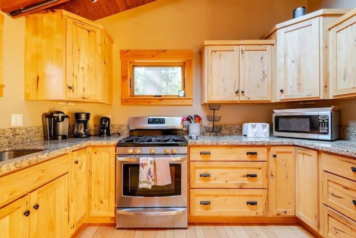 Kitchen range, counters, and appliances.