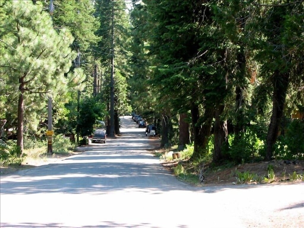 The quiet road down to the lake and Sunnyside on the lake side of the highway.