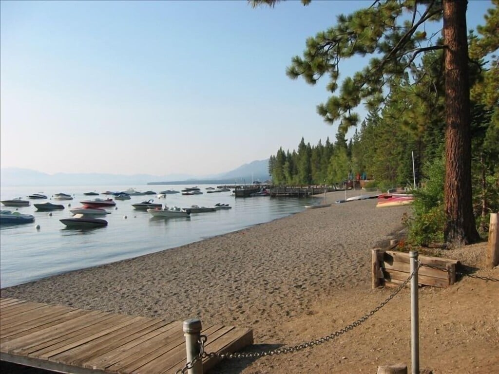 Private homeowners beach with Lake Tahoe shoreline views.