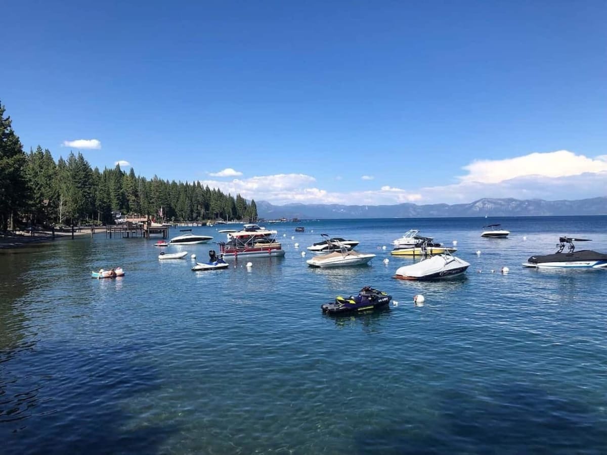 Lake Tahoe boating and beach scene near Tahoe Park.