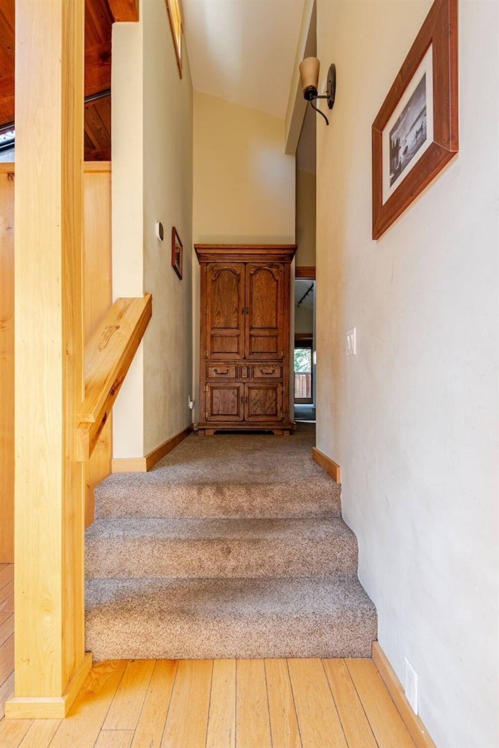 Interior stairs and hallway near the entry.